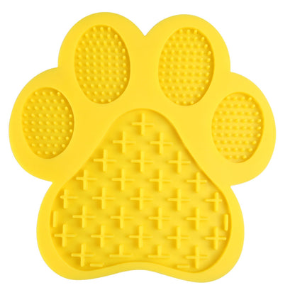 Yellow paw-shaped silicone bath lick pad