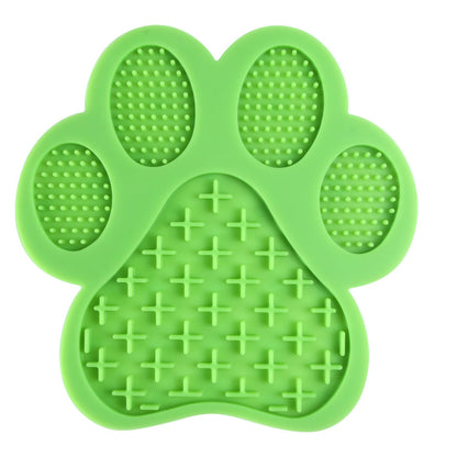 Green paw-shaped silicone bath lick pad